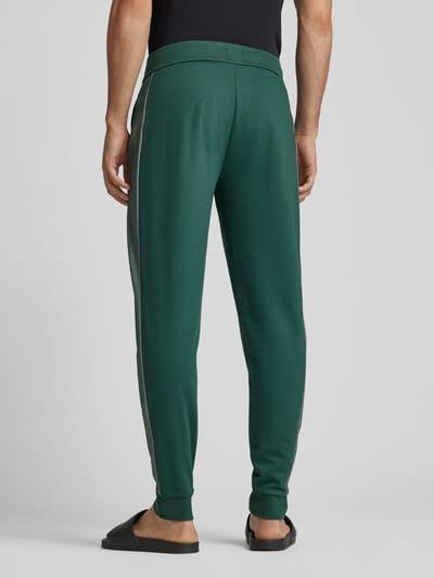 BOSS Tapered fit sweatpants met tunnelkoord, model 'Tracksuit' Groen - 5