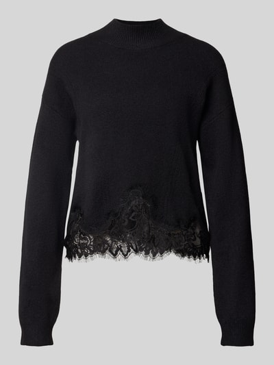 Produktfoto, Regular Fit Strickpullover aus reiner Baumwolle mit Spitzensaum von GUESS in Schwarz mit gerippten Ärmelabschlüssen und Stehkragen