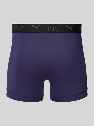 Produktfoto, Slim Fit Trunk mit Logo-Stitching von PUMA in Dunkellila, elastischer Bund, glatte Textur, schlichte Rückansicht