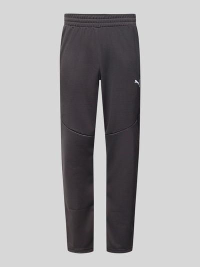 Produktfoto, Sweatpants mit elastischem Bund von PUMA PERFORMANCE in Dunkelgrau, lockerer Schnitt, Label-Print, französische Eingrifftaschen