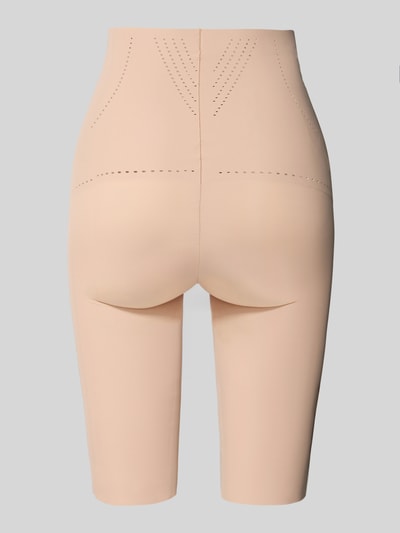 Frauenmodel trägt High Waist Pants mit Lochmuster Modell 'Dream' von MAGIC Bodyfashion, Material-Mix mit Stretch-Anteil, elastischer Bund, Ganzkörperansicht Rückansicht.