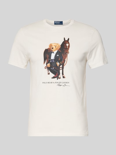 Produktfoto, T-Shirt mit Label-Print und Rundhalsausschnitt von Polo Ralph Lauren, cremefarben, reine Baumwolle, Regular-Fit, Rückenlänge 66 cm in Größe M, Label-Print mit Bär und Pferd auf der Vorderseite, glatte Textur