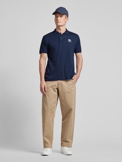 Lacoste Poloshirt mit Label-Print Modell 'Piquet' Dunkelblau 1