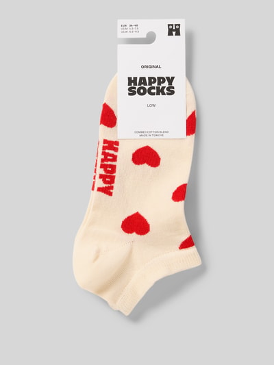 Produktfoto, Sneakersocken aus Baumwoll-Mix Modell 'HEART' von Happy Socks für Damen mit rotem Herz-Muster, elastisches Rippenbündchen, Label-Detail.