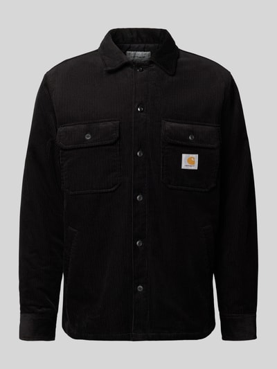Produktfoto, Regular Fit Hemdjacke aus Cord Modell 'WHITSOME' von Carhartt Work In Progress in zwart met labelpatch, puur katoen, platte kraag, borstzakken en zijzakken, corduroy textuur, heren