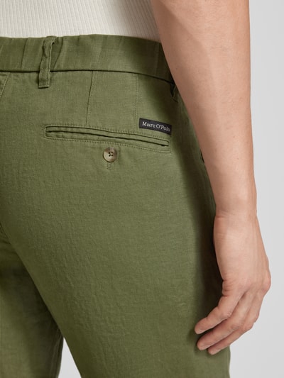 Marc O'Polo Spodnie lniane o kroju tapered fit z zakładkami w pasie model ‘Osby’ Oliwkowy 3