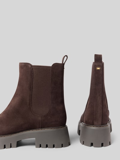 Produktfoto, dunkelbrauner Stiefel aus Leder-Mix Modell 'Asher' von MICHAEL Michael Kors, Profilsohle, abgerundete Form, strukturierte Textur