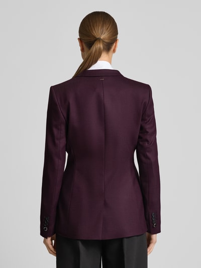 Frauenmodel trägt taillierten Damen Blazer aus Woll-Mix Modell 'JUICYLARA2' von BOSS, Optik: Unifarben, Ganzkörperansicht Rückansicht.