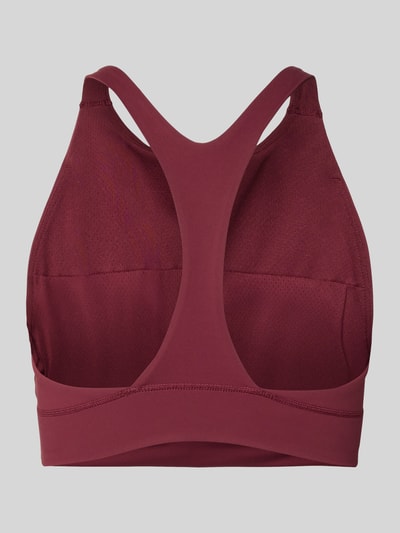 Productfoto, 'PUMA x HYROX - BH met labelprint' van PUMA, bordeauxrood, stretchmateriaal, nauwsluitend, ronde hals, elastische band