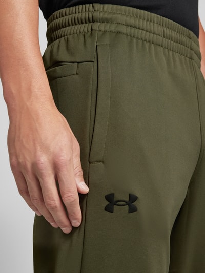 Under Armour Loose Fit Sweatpants mit seitlichen Eingrifftaschen Oliv 3