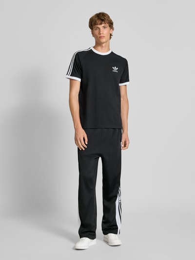 adidas Originals Spodnie treningowe z detalami z logo Czarny 1