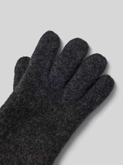 Produktfoto, Walkhandschuhe aus reiner Schurwolle von Roeckl in Dunkelgrau, Strick-Optik, eingefasste Abschlüsse, Label-Detail, weiche Textur