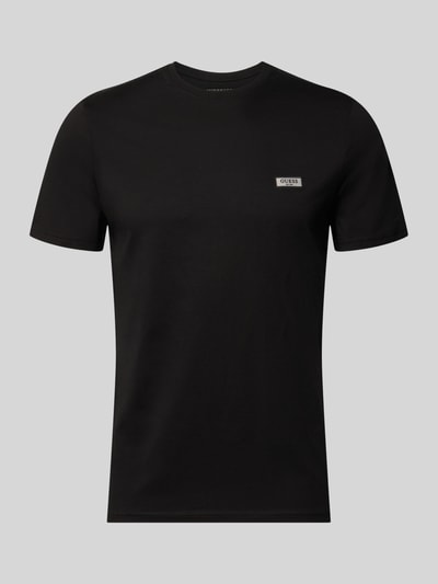 Produktfoto, Slim Fit T-Shirt mit Rundhalsausschnitt von GUESS in Schwarz, reine Baumwolle, Label-Stitching auf Brust, schlichte Textur