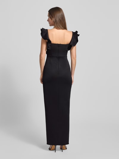 Frauenmodel trägt Abendkleid mit Volants von Lipsy in Schwarz, taillierter Schnitt, Square-Neck, Rückansicht, Ganzkörperansicht.