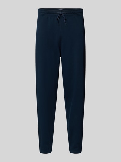Produktfoto, dunkelblaue Regular Fit Sweatpants aus Baumwoll-Mix von Tommy Jeans mit Tunnelzug, elastischem Bund und Eingrifftaschen, unifarbene Sweat-Optik