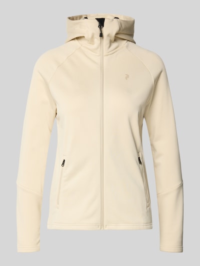 Produktfoto, beigefarbene Softshell-Jacke mit Kapuze Modell 'RIDER' von PEAK PERFORMANCE, Stretch-Material, Reißverschluss, Label-Detail.