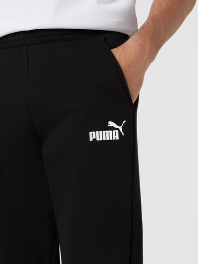 PUMA PERFORMANCE Spodnie dresowe z nadrukiem z logo Czarny 3