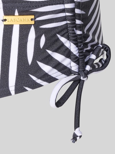 Produktfoto, Bikinihose mit seitlichen Raffungen Modell 'Liv' von LASCANA, Schwarz-Weiß-Allover-Look, glatte Textur, Material-Mix mit Stretch-Anteil