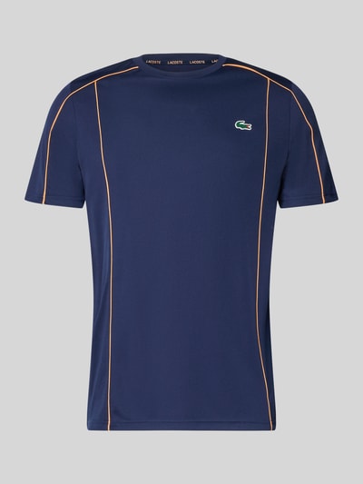 Produktfoto, Regular Fit T-Shirt mit UV-Schutz 50+ von Lacoste Sport in Dunkelblau mit Kontraststreifen, Logo-Patch und Logo-Print, unifarbene Piqué-Oberfläche