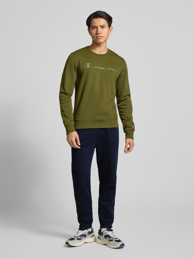 CHAMPION Spodnie dresowe z elastycznym ściągaczem Granatowy 1