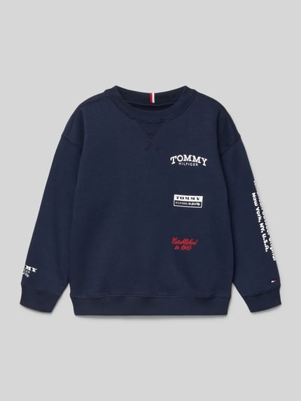 Produktfoto, Regular Fit Sweatshirt aus Baumwoll-Mix von Tommy Hilfiger Kids in effen donkerblauw, labelprint, lange mouwen, ribboorden, ronde hals, katoenmix sweatmateriaal.