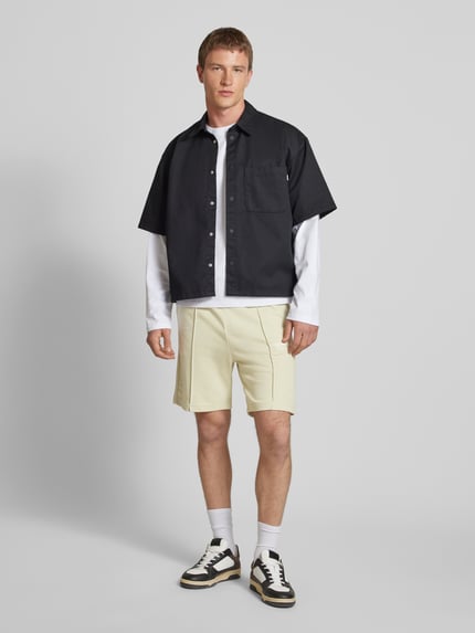JACK & JONES Szorty z dzianiny dresowej z nadrukiem z logo model ‘KANE’ Miętowy 1