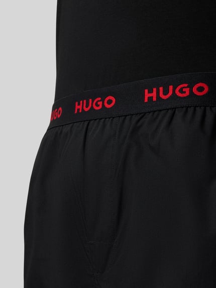 Produktfoto, czarne spodnie piżamy z elastycznym pasem z logo HUGO, gładka tkanina, Regular Fit Pyjama aus reiner Baumwolle Modell 'IVARA SET' von HUGO, Herren Pyjama