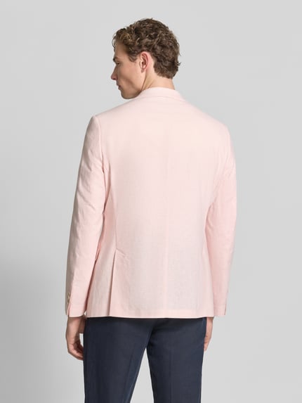Męski model nosi Sakko aus Leinen-Mix mit Pattentaschen von MCNEAL, jasnoróżowy, gładka faktura, krój modern fit, długość pleców 72 cm, szerokość w rozmiarze 50: 45 cm, długość rękawa 63 cm, widok całej sylwetki z tyłu.