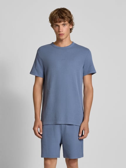 Tommy Jeans T-shirt o kroju slim fit ze strukturalnym wzorem Jeansowy niebieski 4
