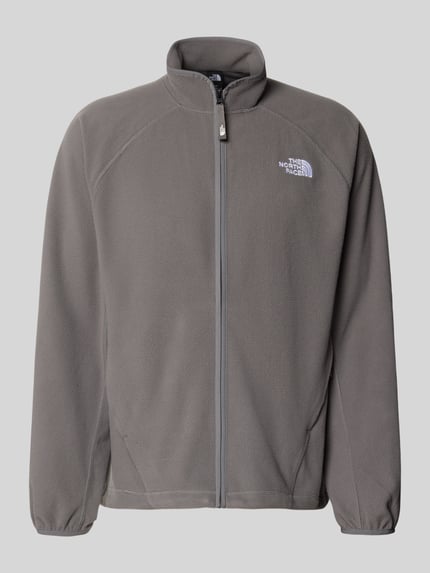 Produktfoto, grijze Fleecejacke met labelstitching van The North Face, regular fit, opstaande kraag, ritssluiting, ruglengte maat M 69 cm, mouwlengte maat M 69 cm