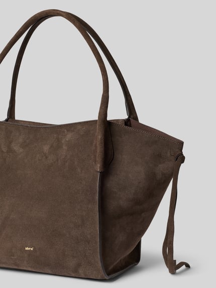Produktfoto, Handtasche aus echtem Leder Modell 'VIBE' von Abro in Braun, samtige Textur, schmale Tragehenkel, seitliche Bindebänder.