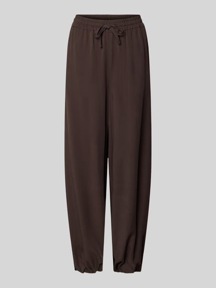Produktfoto, Hose mit Baloon Saum und elastischem Bund von Smith and Soul aus reinem Lyocell in Braun mit Loose-Fit, Kordelzug und französischen Eingrifftaschen, Bundweite 36 cm, Innenbeinlänge 69 cm, weiche Textur