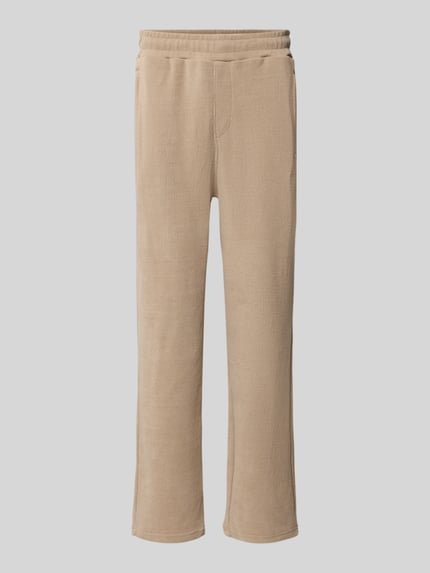 Wide Fit Sweatpants mit Label-Detail Modell 'Mezzano' Shop The Look MANNEQUINE