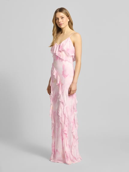 Vrouwenmodel draagt Slim Fit Maxikleid mit Rüschenbesatz van Jake*s Cocktail, spaghetti bandjes, V-hals, allover-print, geheel lichaamsaanzicht van voren.