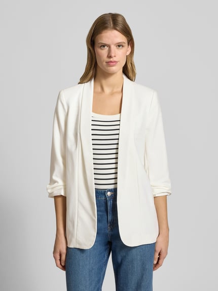 Frauenmodel trägt Regular Fit Longblazer mit Viskose-Anteil Modell 'BOSELLA' von Pieces, Optik: Unifarben, Webstruktur, Ganzkörperansicht von vorne.