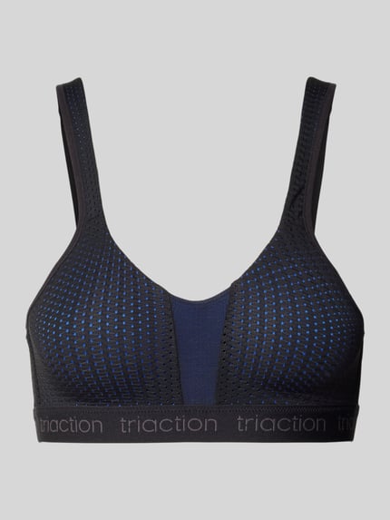 Produktfoto, biustonosz z elastycznej mieszanki materiałów z detalem z logo, model 'Triaction Energy Lite' od Triumph, zapiecie na haftkę, regulowane ramiączka, ciemnoniebieski z teksturą mesh