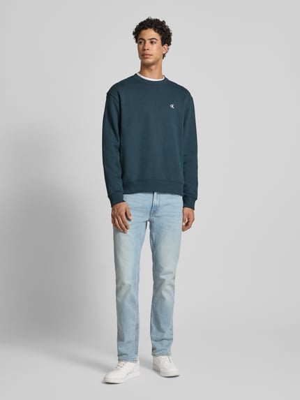 Calvin Klein Jeans Jeansy o kroju slim fit z efektem znoszenia i detalem z logo Jeansowy niebieski 1