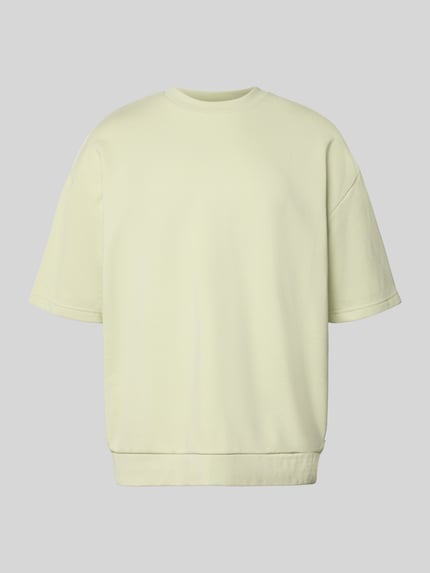 Produktfoto, Oversized T-Shirt mit Rundhalsausschnitt von Lindbergh, hellgelb, weiche Baumwoll-Mix Textur, Label-Detail, Rückenlänge 70 cm bei Größe M