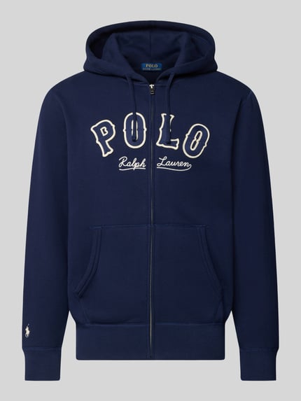 Produktfoto, Sweatjacke mit Label-Stitching und Känguru-Tasche von Polo Ralph Lauren in Dunkelblau, Baumwoll-Mix, Regular-Fit, Kapuze mit Tunnelzug, Reißverschluss, Känguru-Tasche, Rückenlänge 70 cm, Ärmellänge 65 cm.