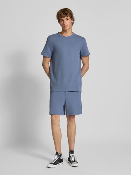 Tommy Jeans T-shirt o kroju slim fit ze strukturalnym wzorem Jeansowy niebieski 1