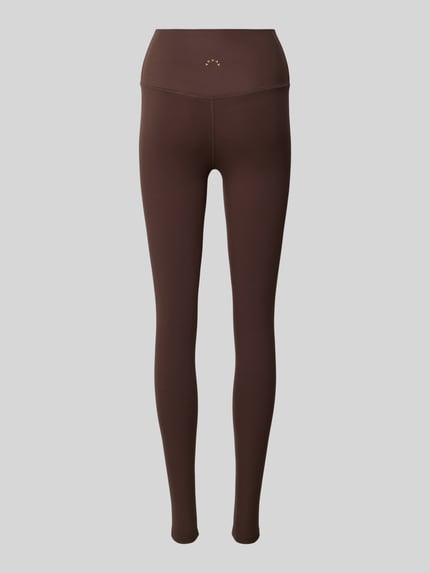 Produktfoto, Slim Fit Leggins mit Logo-Print Modell 'Freesoft' von VARLEY, brauner elastischer Stoff, schlichte Struktur, Damen Leggins