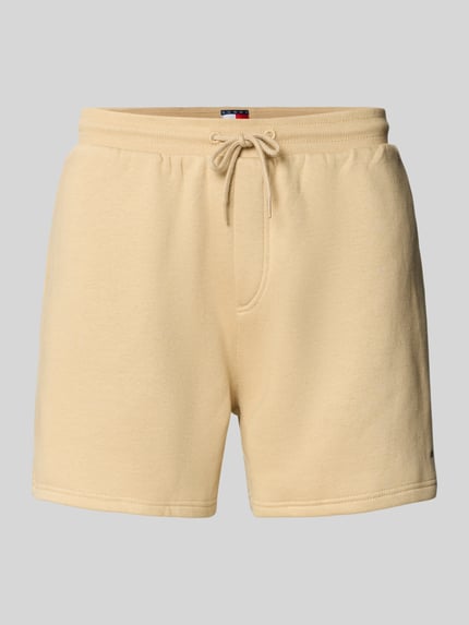 Produktfoto, Regular Fit Shorts aus Baumwoll-Mix von Tommy Jeans in Optik: Unifarben, elastischer Bund mit Tunnelzug, Sweat-Material, Logo-Detail.