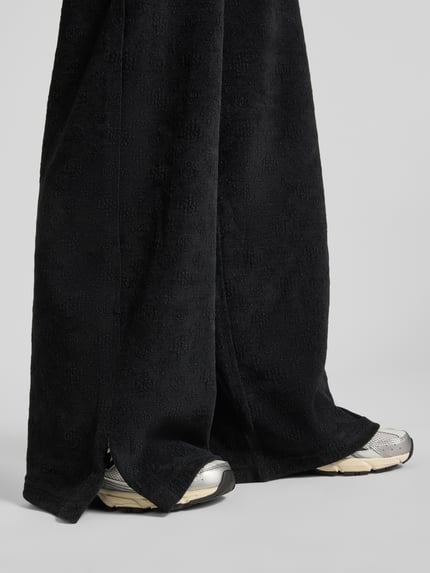 GUESS Activewear wide leg sweatpants met logomotief model 'LAUDOMIA' Zwart - 3