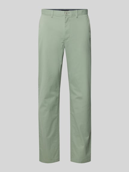 Produktfoto, Slim Fit Chino aus Baumwoll-Mix von Tommy Hilfiger in Hellgrün, unifarben, glatte Oberfläche, sichtbare Gürtelschlaufen und Knopf