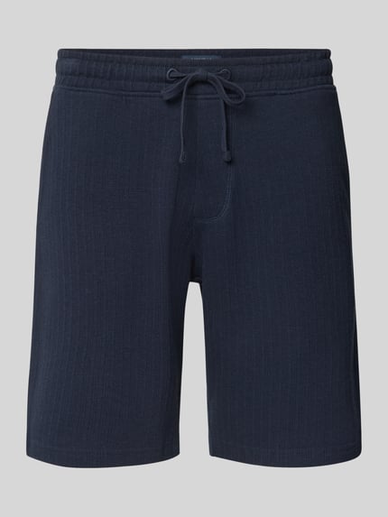 Produktfoto, Regular Fit Shorts mit Tunnelzug von MCNEAL z bawełnianego miksu ze stretchem, krój regular fit, kieszenie, tylna kieszeń, Szerokość w rozmiarze M: 43 cm, długość wewnętrzna nogawki w rozmiarze M: 23 cm, ciemnogranatowa, widoczna tekstura materiału