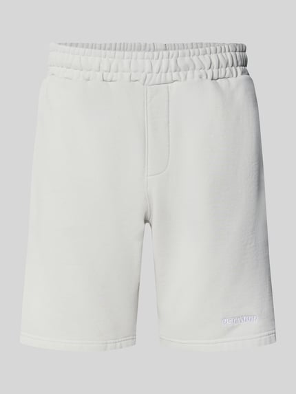 Produktfoto, Shorts mit elastischem Bund und Logo-Stitching von Pegador aus Baumwoll-Mix in Weiß, Loose-Fit, Vorderseite sichtbar.