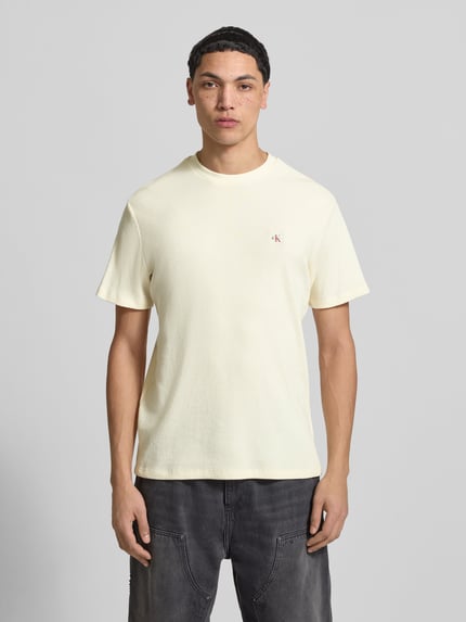 Calvin Klein Jeans T-shirt w kroju regular fit z naszywką z logo Beżowy 4