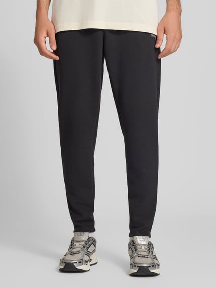 PUMA Performance Spodnie dresowe o kroju regular fit z dodatkiem lyocellu Czarny 4