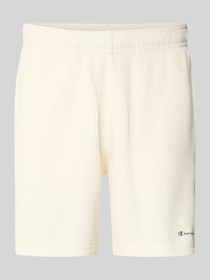 Produktfoto, Shorts mit Strukturmuster und elastischem Bund von CHAMPION aus Baumwoll-Mix in Creme, Regular Fit, sichtbares Label-Stitching.