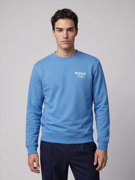 Männermodel trägt Regular Fit Sweatshirt aus reiner Baumwolle Modell 'Nespon' von HUGO Blue, uni, Motiv-Print, Rundhals, gerippte Abschlüsse, Jersey, 100% bawełna, Ganzkörperansicht von vorne.